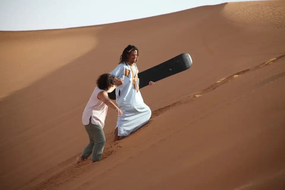 Sandboarding in Merzouga Dunes
