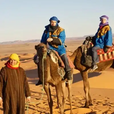 Hamou, co-founder of Milagro Luxury Camp, guiding a camel trek