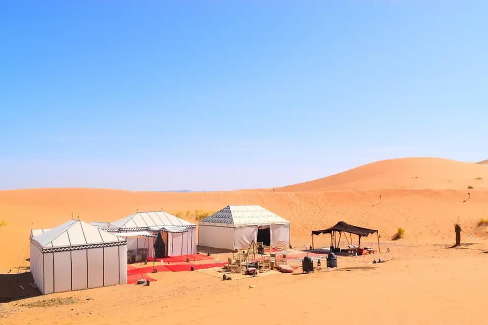 Milagro Luxury Camp tents among the Erg Chebbi dunes in Merzouga